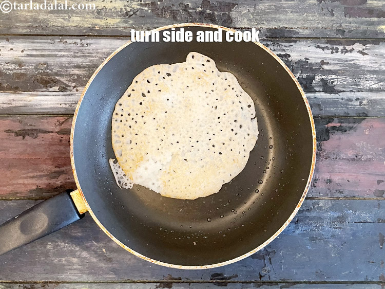 Step 52 – <meta charset="UTF-8" />and turn the side and cook on a medium flame for 1&nbsp;minute.&nbsp;