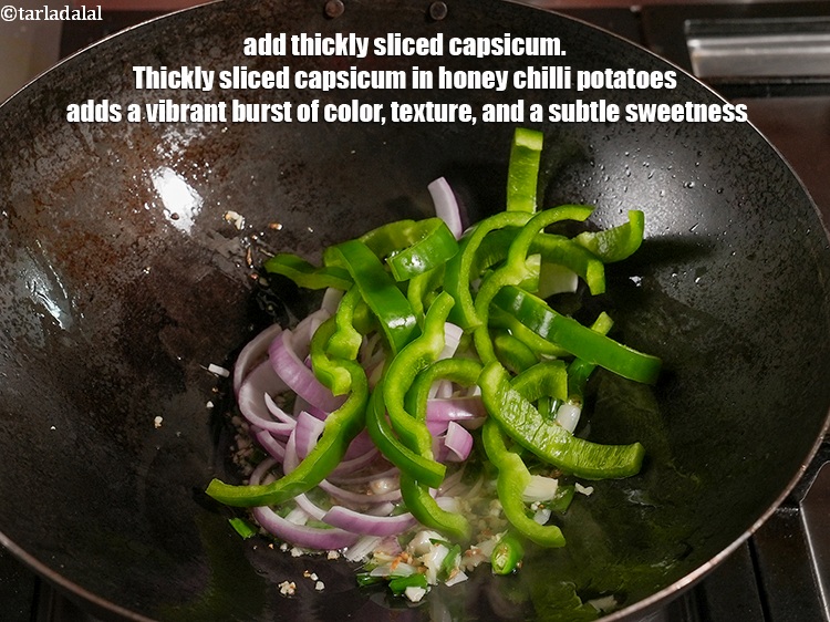 Step 41 – Add 1 cup thickly <a href="https://www.tarladalal.com/glossary-sliced-capsicum-165i">sliced capsicum</a>. Thickly sliced capsicum in honey chilli potatoes adds …