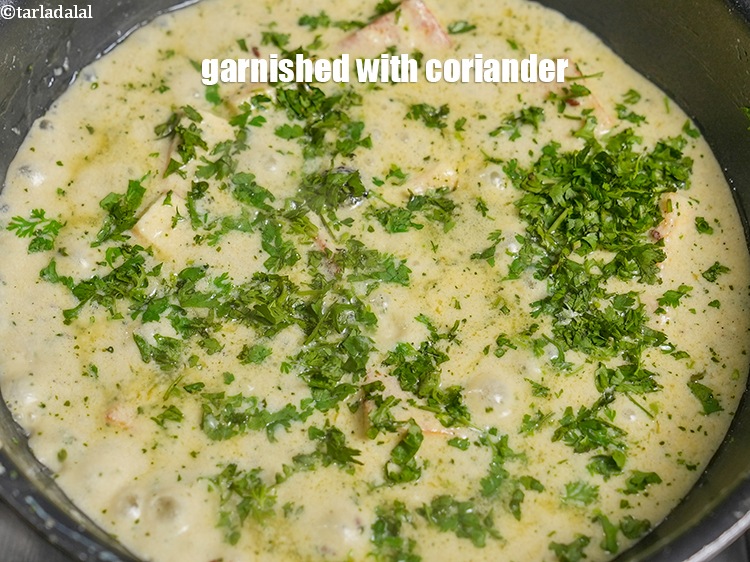 Step 42 – Add garnished with 2 tbsp&nbsp;finely&nbsp;<a href="https://www.tarladalal.com/glossary-chopped-coriander-783i">chopped coriander (dhania)</a>
