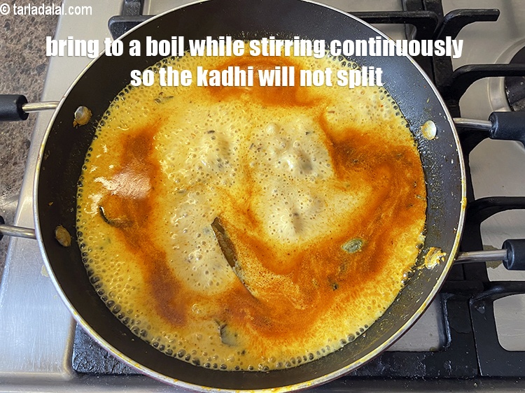 Step 43 – Bring to a boil while stirring continuously, so that the kadhi does not split.&nbsp;