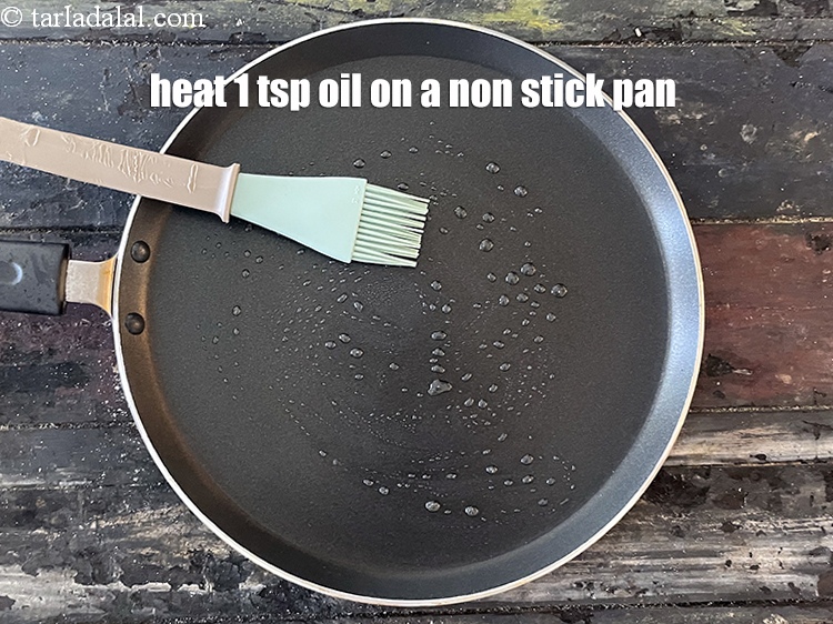 Step 42 – <meta charset="UTF-8" />&nbsp;Heat 1 tsp oil on a non stick pan.&nbsp;