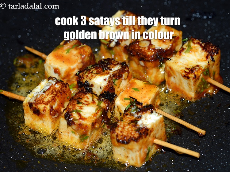 Step 43 – Cook 3 satays at a time till they turn golden brown in colour form both …
