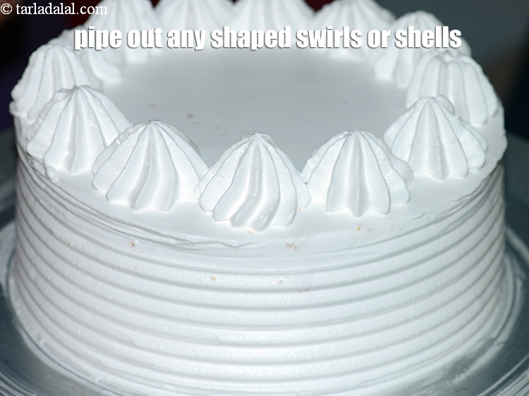 Step 50 – Pipe out any shaped swirls or shells on the top circumference to decorate the cake.&nbsp;