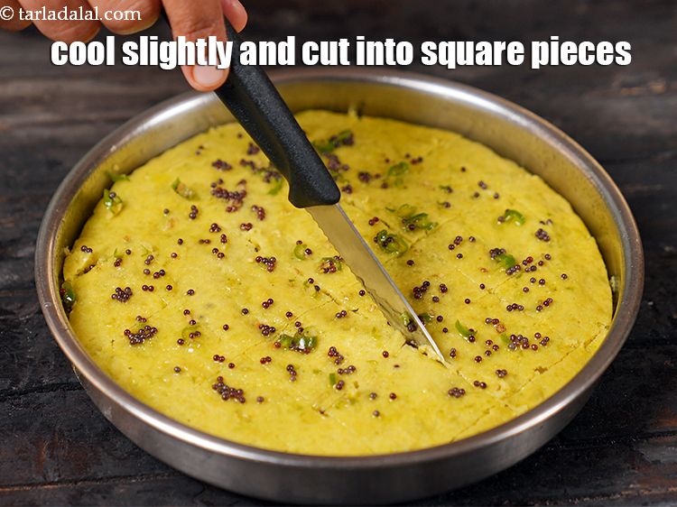 Step 35 – Cool slightly and cut into square pieces. Now start making the second dhokla thali.