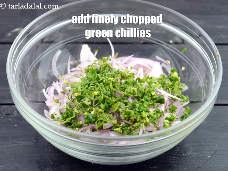 Step 50 – Add 2 tsp&nbsp;finely&nbsp;<a href="https://www.tarladalal.com/glossary-chopped-green-chilli-820i">chopped green chillies</a>.&nbsp;