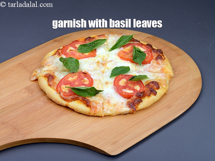 Step 43 – Garnish with basil leaves.