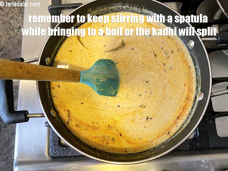 Step 44 – Remember to keep stirring with a spatula while bringing to a boil or the kadhi …
