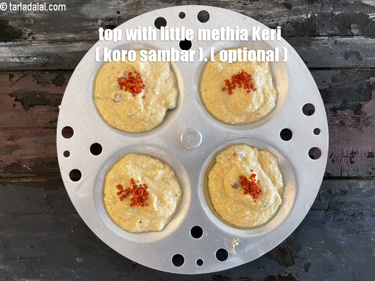 Step 42 – Top with a pinch of methia keri, optional&nbsp;(koro sambar) or any achar masala.