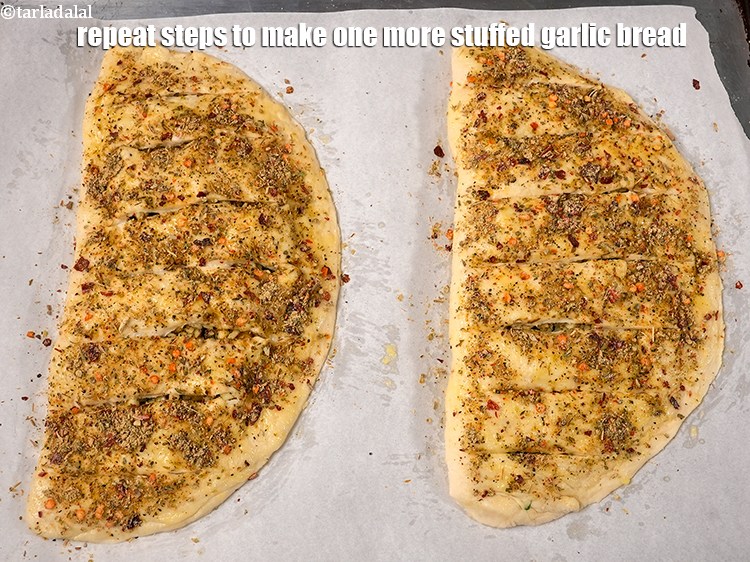 Step 45 – Repeat steps to make one more stuffed garlic bread.