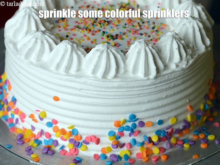 Step 51 – Sprinkle some colorful sprinklers of your choice on the top and sides of the cake.