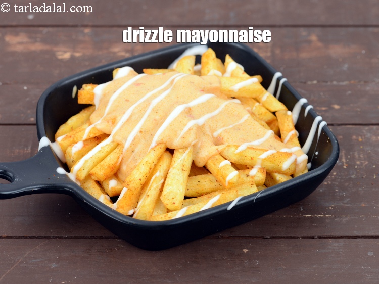 Step 46 – Drizzle 1 tbsp&nbsp;<a href="https://www.tarladalal.com/glossary-mayonnaise-505i">mayonnaise</a>.