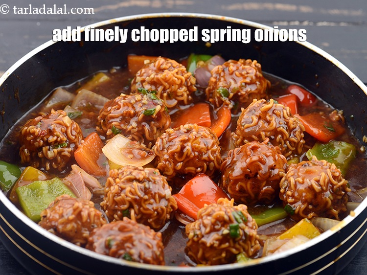 Step 44 – Add finely chopped spring onions and mix well.&nbsp;