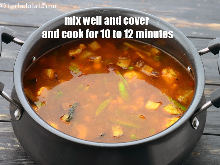 Step 45 – Mix well and cover with a lid and cook on a medium flame for 10 …