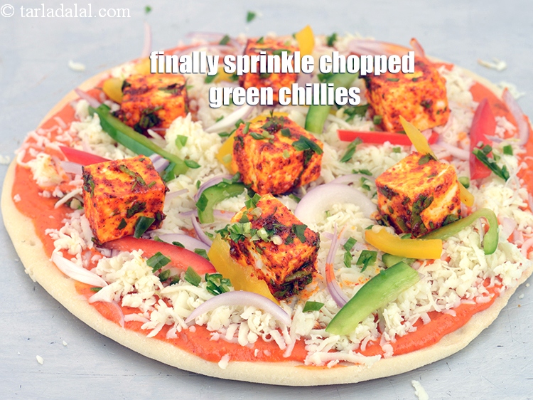 Step 46 – Finally sprinkle &frac14; tsp <a href="https://www.tarladalal.com/glossary-chopped-green-chilli-820i">chopped green chillies</a>.&nbsp;