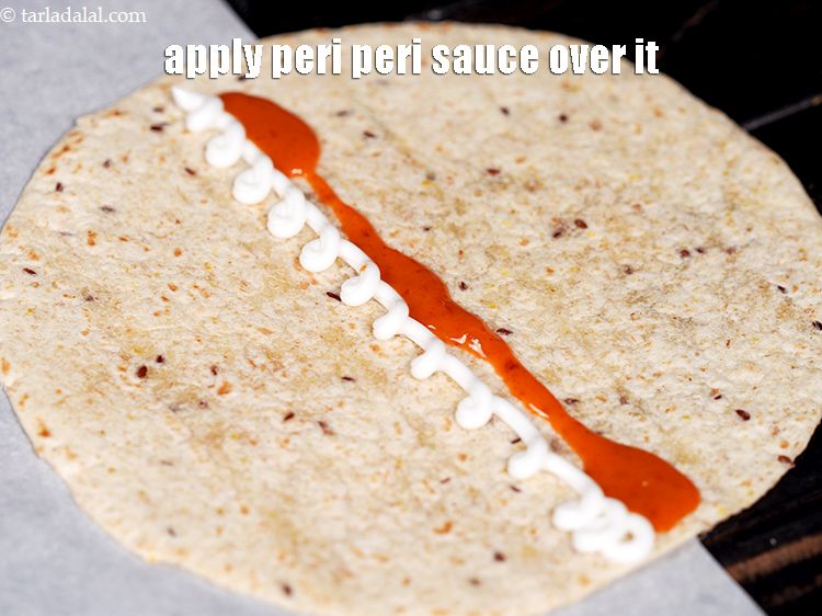 Step 45 – Apply 1 tbsp peri peri sauce over it.&nbsp;
