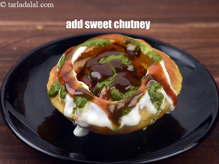 Step 48 – Add 2 tbsp&nbsp;<a href="https://www.tarladalal.com/sweet-chutney-22265r">sweet chutney</a>.