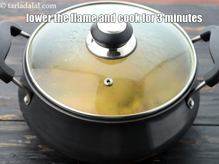 Step 46 – Lower the flame and cook for 3 minutes, while stirring occasionally.