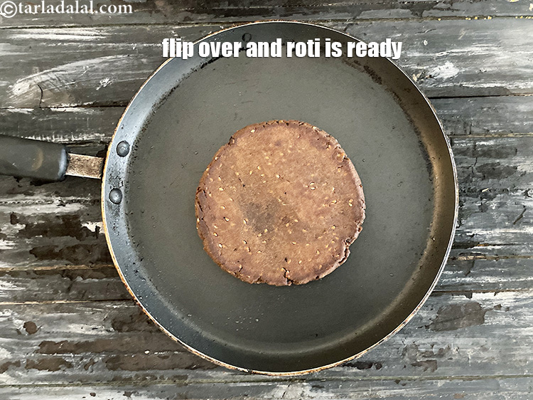 Step 55 – Flip over. You kala gur ki roti is ready.