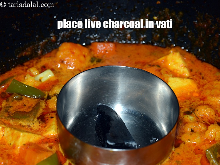 Step 46 – Place the live charcoal in the vati.