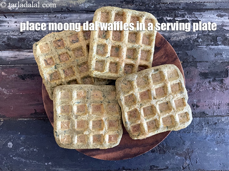 Step 47 – <meta charset="UTF-8" /> Place&nbsp;<strong>moong dal waffles</strong> in a serving plate.