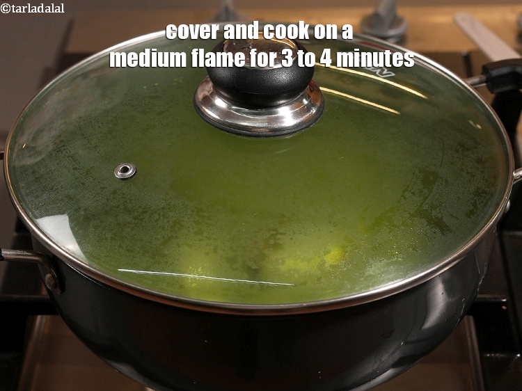Step 46 – Cover and cook on a medium flame for 3 to 4 minutes, while stirring occasionally.