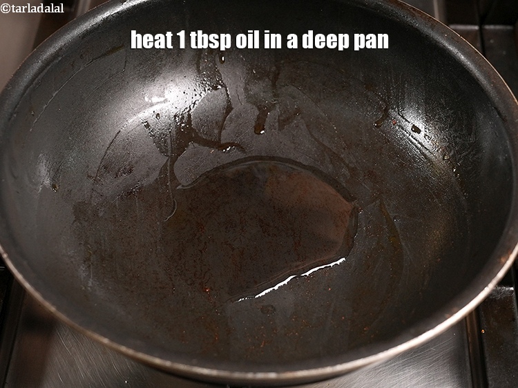 Step 46 – Heat 1 tbsp oil in a deep pan.
