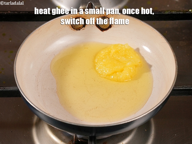 Step 46 – Heat 1 tbsp&nbsp;<a href="https://www.tarladalal.com/glossary-ghee-245i">ghee</a> in a small pan, once hot, switch off the flame.
