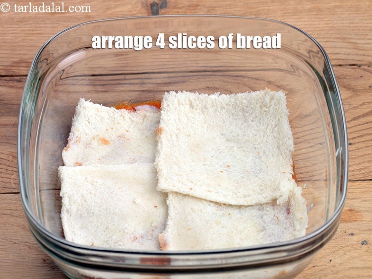 Step 47 – Arrange 4 slices of <a href="https://www.tarladalal.com/glossary-bread-219i">bread</a> overlapping each other.