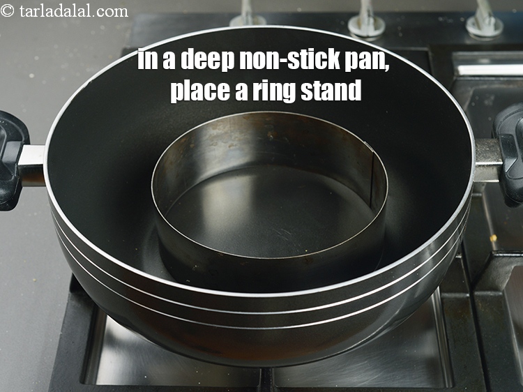Step 46 – In a deep non-stick pan, place a ring stand.