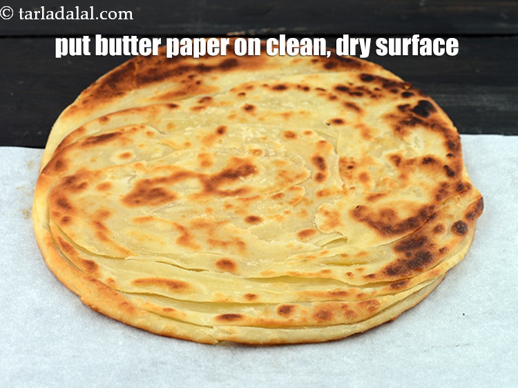 Step 54 – Place the butter paper on a clean, dry surface.