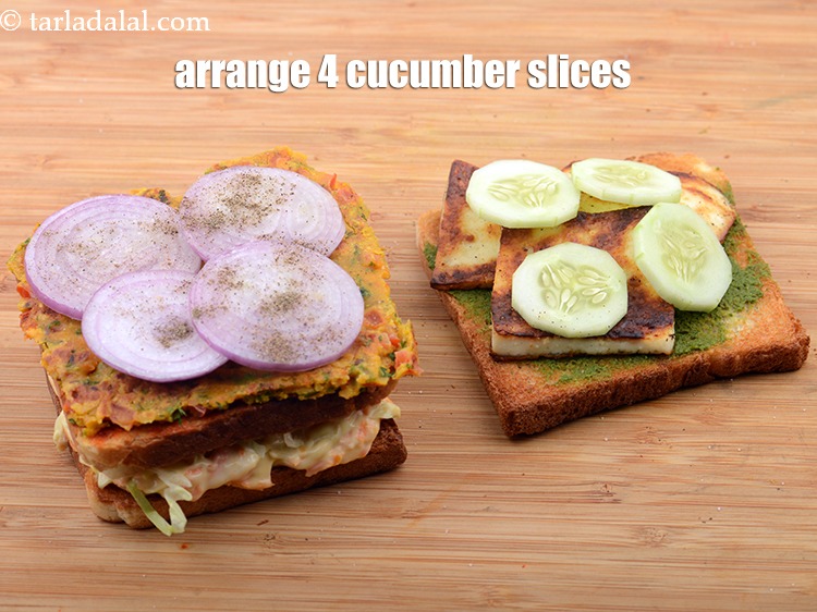 Step 48 – Arrange 4 <a href="https://www.tarladalal.com/glossary-cucumber-slices-2698i">cucumber slices</a>&nbsp;over it.