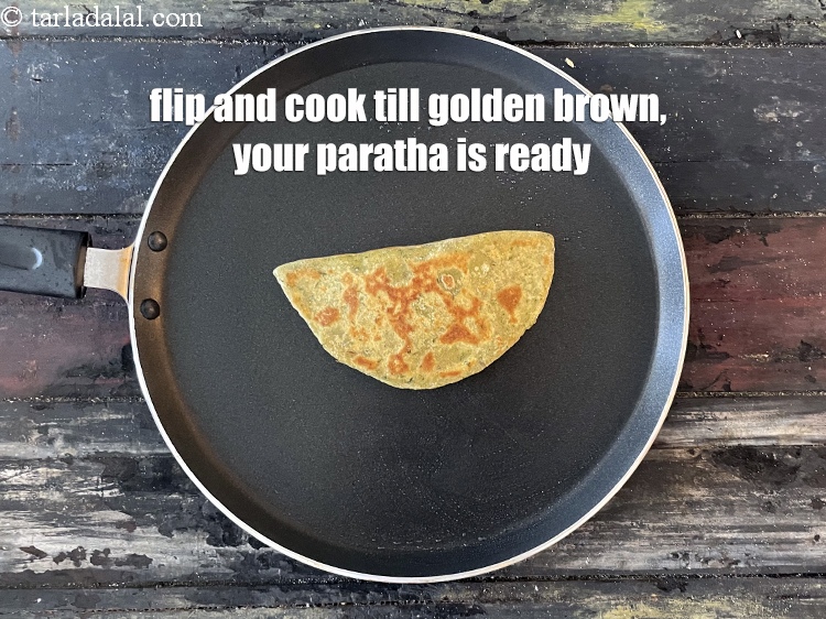 Step 48 – <meta charset="UTF-8" />Flip and cook till golden brown.&nbsp;Your paratha is ready.&nbsp;&nbsp;
