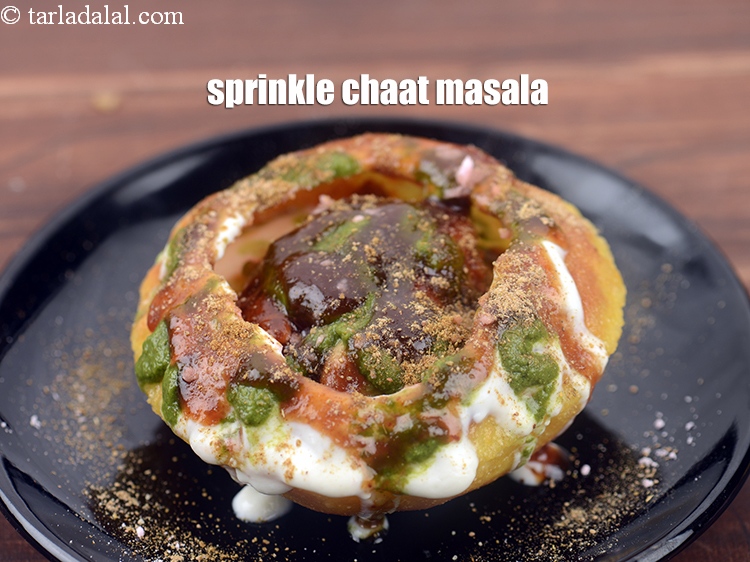 Step 51 – Sprinkle <a href="https://www.tarladalal.com/glossary-chaat-masala-300i">chaat masala</a>.