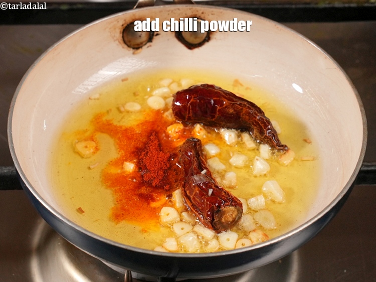 Step 49 – Add&nbsp;1/4 tsp&nbsp;<a href="https://www.tarladalal.com/glossary-chilli-powder-red-chilli-powder-339i">chilli powder</a>.