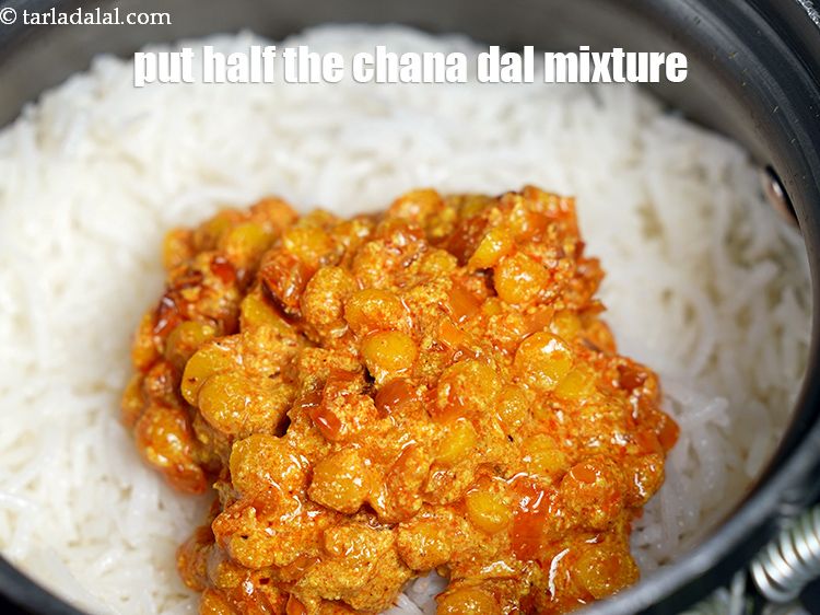 Step 51 – Put half the chana dal mixture.
