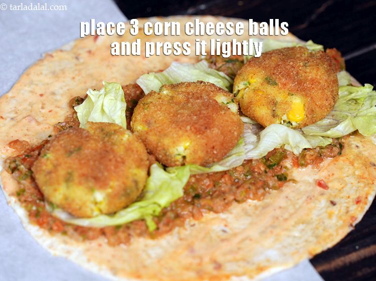 Step 50 – Place 3 corn cheese balls and press it lightly.&nbsp;&nbsp;