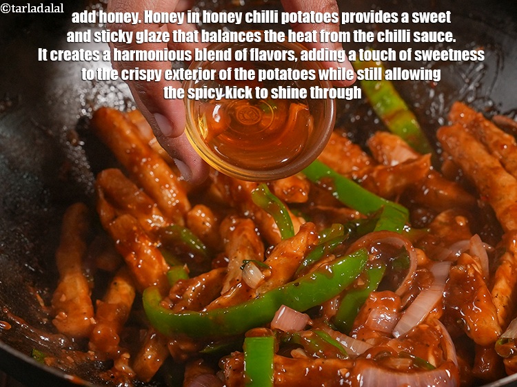 Step 49 – Add 1 tbsp <a href="https://www.tarladalal.com/glossary-honey-467i">honey</a>. Honey in honey chilli potatoes provides a sweet and sticky …