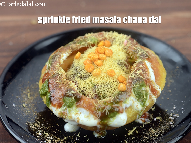 Step 53 – Sprinkle 1 tbsp <a href="https://www.tarladalal.com/glossary-fried-masala-chana-dal-1913i">fried masala chana dal</a>.