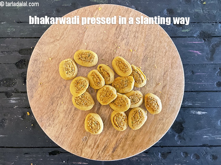 Step 51 – Bhakarwadi pressed in a slanting way.
