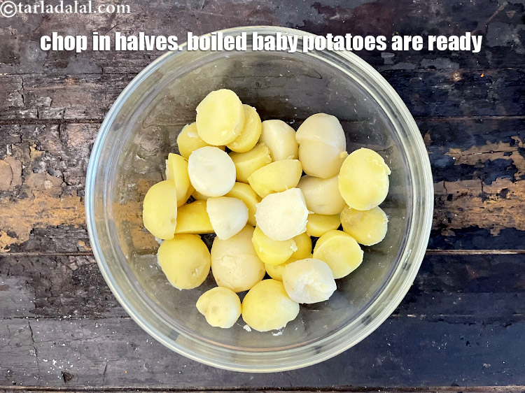 Step 20 – Chop in half. Your peeled and boiled baby potatoes are ready.