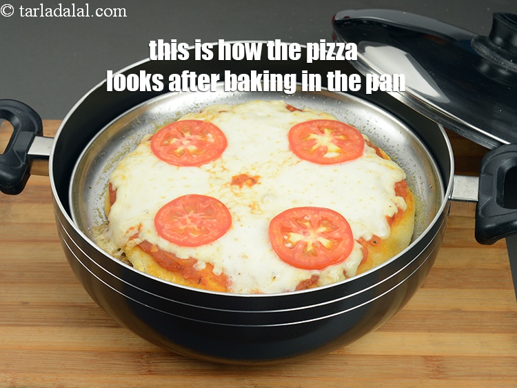 Step 51 – This is how the pizza looks after baking in the pan.