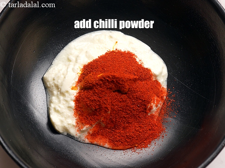 Step 6 – Add 1 &frac12; tbsp red chilli powder.