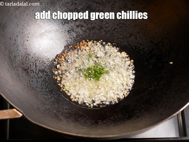 Step 6 – Add &frac12; tsp <a href="https://www.tarladalal.com/glossary-chopped-green-chilli-820i">chopped green chillies</a>.&nbsp;