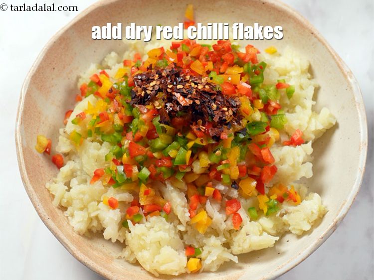 Step 6 – Add 1 tsp&amp;nbsp;&lt;a href=&quot;https://www.tarladalal.com/glossary-dry-red-chilli-flakes-paprika-338i&quot;&gt;dry red chilli flakes (paprika)&lt;/a&gt;.