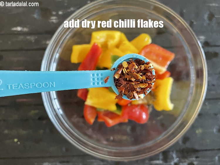 Step 7 – Add&nbsp;<meta charset="UTF-8" />1/2 tsp&nbsp;<a href="glossary-dry-red-chilli-flakes-paprika-338i">dry red chilli flakes (paprika)</a>.