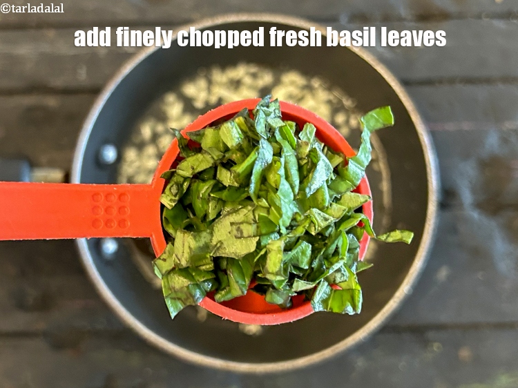 Step 13 – Add&nbsp;1 tbsp&nbsp;finely&nbsp;<a href="glossary-chopped-basil-804i">chopped basil</a>.
