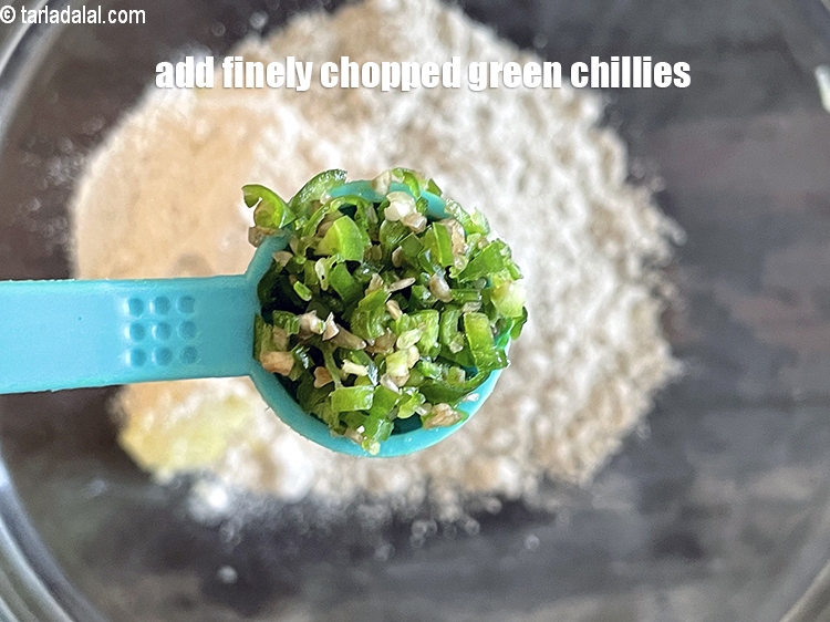 Step 6 – Add&nbsp;<meta charset="UTF-8" /><strong>1/2&nbsp;tsp</strong>&nbsp;<a href="glossary-chopped-green-chilli-820i">green chillies , finely chopped</a>.