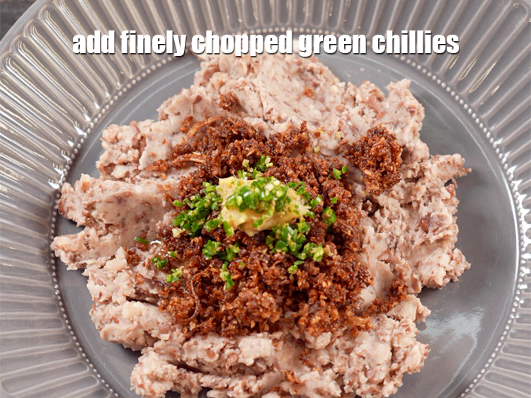 Step 10 – Add 1 tsp finely <a href="https://www.tarladalal.com/glossary-chopped-green-chilli-820i">chopped green chillies</a>.