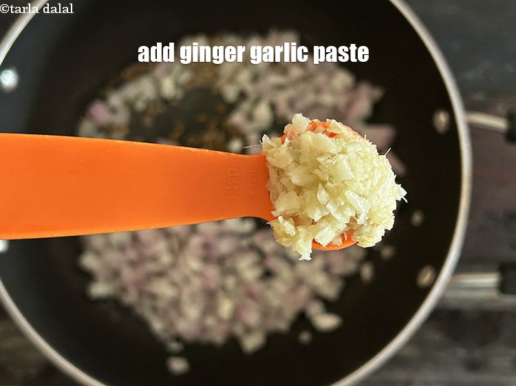Step 8 – Add <strong>1 tsp ginger garlic paste.</strong>