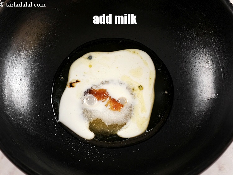 Step 6 – Add 1 tbsp <a href="https://www.tarladalal.com/glossary-milk-doodh-full-cream-milk-514i">milk</a>.